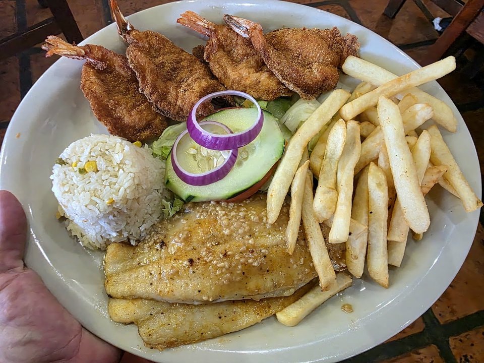 Seafood plates on a casual restaurant table.